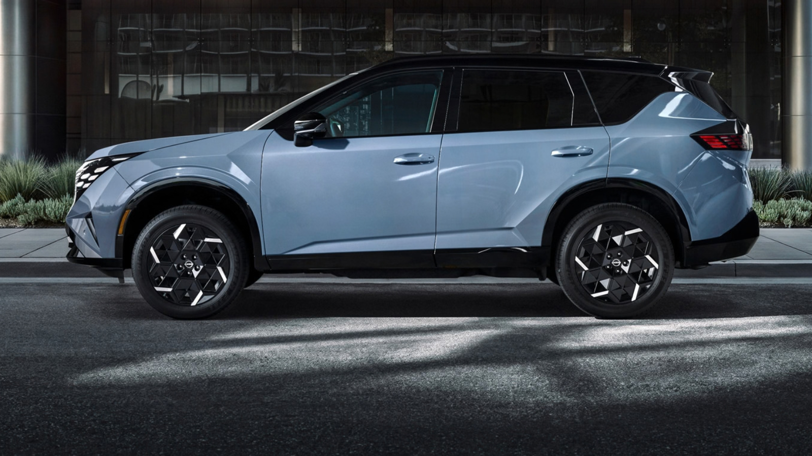 2027 Nissan Rogue Hybrid Driving Through the City 